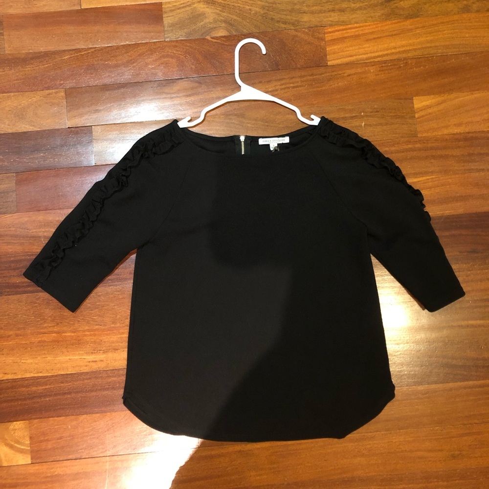 Black 3 quarter sleeve top. Never worn.